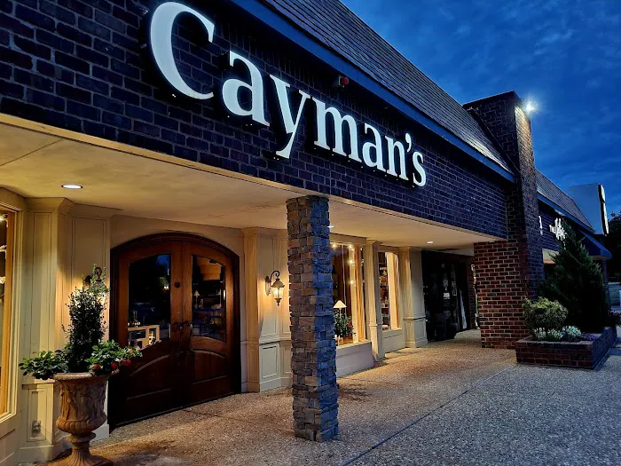Cayman's Clothiers Inc 0