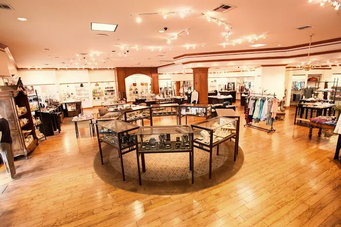 Cayman's Clothiers Inc 8